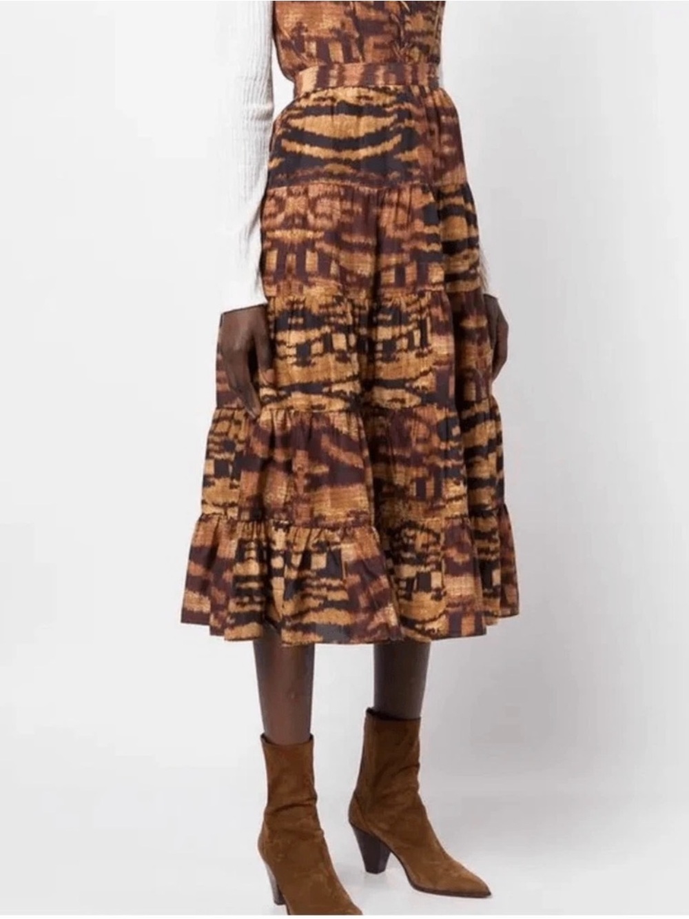 Ulla Johnson tiered silk midi skirt in a multicolour animal print pattern.
